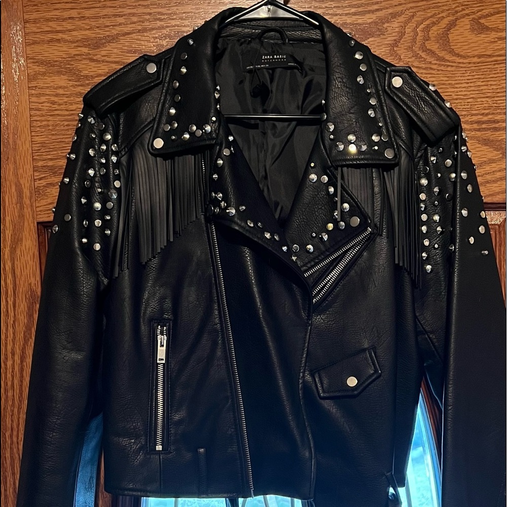 Fringe biker jacket with studs faux leather